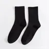 Kvinnors strumpor 1 par svart vit lång för män unisex harjuku streetwear hip humle skateboard casual crew julklappar