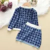 Girl's jurken kinderen meisje pastoraal gebreide set kleding kleding voor babykinderen herfst winter prinses mode casual schattige boog top+korte jurk r230816