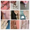 Charme HUICUSAN SÉLOGNES ÉLECTRES CROSS-Shape Drop Orees pour femmes / hommes Dazzlcrystal Zirconia Hiphop Femme / Mâles de mode Femelle J230817