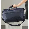 トレンディなユニセックスダッフルバッグが伸びた防水大型容量バッグ軽量の肩の旅行バッグ