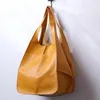 Duffel Väskor Retro 2032 Simple Big Bag Soft läder stor kapacitet en axel handhållen på gränsöverskridande kvinnor