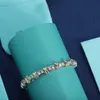 Designer tiffeny smycken 2023 hem tung industri sommar ny inlagd vatten diamant högkvalitativ lyx lyxig utsökt mode mångsidig mässingsarmband kvinnlig