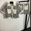 Femme Metal Button Shirt Robe Stripe Short à manches à manches à manches