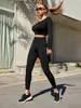 Yoga -outfits 2PCS Naadloze fitness Yoga -pak Tracksuit Gym Set uitgesneden duimgaten Crop Tee Bubble Butt Push Up Leggings 230817