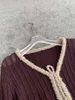 Chandails féminins à aiguille vide Ligne flottante Série de tricot, quatre saisons peuvent correspondre à la taille de la taille et de la douceur délicate du cardigan et de la douceur