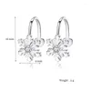 Boucles d'oreilles arrière beaux festivals de festival Clip de fleur fleurie romantique Snowflake simple manche femme