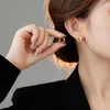Bolzenohrringe Goldfarbe U-förmiger Kreis Frauen einfacher und eleganter französischer Ohr-Accessorie