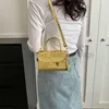 Sac de créateur Sentiment de haut niveau de l'escroquerie 2023 Nouveau inscripteur minimaliste petit carré couleurs de bonbons à main sac de créateurs de femmes caitlin_fashion_bags