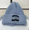 Nouveau chapeau tricoté d'automne chaud châtain épaissis de bain mâle et femelle marque à la mode même chapeau coréen de mode
