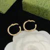 Studri di designer chic classico Orecchini dorati uomini Aretes Women Hoop Earring Glossy Style Glossy Elegant Case con accessori per design in scatola