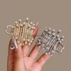 Delicate Pearls Metal Hair Clip voor meisjes 2023 Zomer Hoge paardenstaarthouder Haar Klauw Haarspeld Grab Clips Accessoires