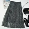 Юбки 2023 Летняя плиссированная юбка для женщины сетчатой ​​клетчатой ​​талию модные цепь декорация