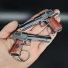 Novelty Items Jedi Survival Desert Eagle Keychain Wooden Handle Gun Model Chicken Game Around Pendant Boy Gift Decoration Ornaments R230818