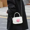 Torba projektantów różowy łańcuch miłosny mały kwadrat dla kobiet 2023 Wersja koreańska High Grade Girl Cute Contrast Color Handheld Crossbody Bag Caitlin_fashion_bags