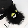 luxe FEN Fluffy Karl Véritable Fourrure De Raton Laveur Pompon Monstre Sac Bugs Charme Porte-clés En Peluche Porte-clés En Cuir Gland Pompon