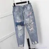 Kvinnors jeans Nytt plus size Women's NinePoint Hole Denim Harem Pants Loose Beggar AnkleLength Cross Pants Ripped Jeans for Women J230818
