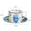 Tazze di caffè tazza d'occhio vintage design per mani set da tè in porcellana set di porcelle di porcellane e piattini piatto di tazza di bevande in ceramica regalo di Natale 230818