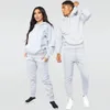 Sweats à capuche masculine Sweatshirts Brand Men de piste de piste de jogging Jogging Sportswear Set Couple Sweat à capuche Pantalons à capuche Femmes Pantalon Custom Your 230817