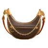 Pętla M81098 Półksiężycowa torba damska hobo designer luksusowy Louise Woman oryginalna skórzana torebka TOTE VUTTON Crossbody Metal Cain Łańcuchy