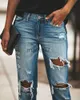 Jeans feminino 2022 Novas mulheres moda no meio do namorado Big Ripped Hole Hole High Street calça jeans sexy lápis vintage jeans J230818