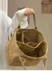 デザイナーバッグジャパンアンド韓国インターレイヤーキャンバスポータブルベント学生通勤マルチレイヤーハンドバッグクロスボディ女性デザイナーバッグcaitlin_fashion_bags