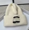 Nouveau chapeau tricoté d'automne chaud châtain épaissis de bain mâle et femelle marque à la mode même chapeau coréen de mode