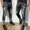 Mäns jeans europeiska och amerikanska modehål ungdomskläder ankel blixtlås elastisk rippad