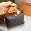 Empreinte Leather ToteデザイナーSACスポーツハンドバッグ女性Luxurysデザイナーの下にあるビッグホーボーエンボストート財布買い物客