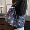 Large Capacity 2023 Commuter Handbag Women's New Graffiti Denim One Shoulder Tote Bag Fashionable Versatile Underarm Bag 230815