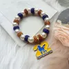 Strand Personalizado Asociación de Hermanas SGR SGR METAL POODLE PENDIZACIÓN Números griegos Pulseras elásticas