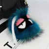 luxe FEN Fluffy Karl Véritable Fourrure De Raton Laveur Pompon Monstre Sac Bugs Charme Porte-clés En Peluche Porte-clés En Cuir Gland Pompon