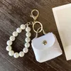 Kliny kreatywne mini monety torebki kobiety eleganckie naśladowanie perłowe pasek na nadgarstek Pasek do wiszący ozdoby dekoracje imprezowe prezent