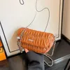 Designväska sommar doftande stil kvinnor 2023 nya mode crossbody kedja liten kvadrat designer väska caitlin_fashion_bags