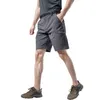 Mäns shorts sommarcamping och bergsbestigning ryggsäck med flera fickor elastisk andningsbar snabb torkning avslappnad