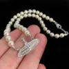 Luksusowy Pearl Saturn Naszyjnik Pendant Wisted Złote naszyjniki dla kobiet proste styl Srebrna biżuteria