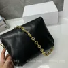 Diseñador de moda para mujer Bolsos de hombro Personalidad Moda Versátil Cuero genuino Cadena exquisita Temperamento Bolsos de mujer de alta calidad