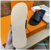 sandalias de diseñador sandalia de cuero de lujo para mujer zapatos planos de verano moda playa hombres zapatillas letra arrastre Diapositivas chanclas zapatilla grande