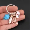 Keychains Lanyards Fashion Nurse Hat Stethoscope Syringe Mask Alloy Keychain Medical Tool Pendant Student Gift Souvenir Drop Delivery Smtbt