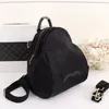 Designer mochila mochila nova versão coreana da mochila multifuncional Oxford pano impermeável bolsa de ombro bolsa rede estrela vermelha com o mesmo modelo