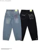 Pantalons pour hommes brodés jeans à jambes larges droites pour hommes et femmes vêtements de rue 2023 New Harajuku lettre casual simple jeans de poche Y2k pantalon Z230819