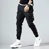 Pantaloni maschili in neri in cotone grigio cotone maschio tasca autunno jogger cuffia per cuffie per le versanti casuali 2023 abbigliamento hip hop