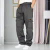 Pantaloni da uomo uomini pantaloni da carico casual eleganti con tasche elastici in giro per la cintura per streetwear sportivo