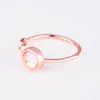 Klusterringar som säljer rosa kristallmånsten ring kvinnlig europeisk och amerikansk 18k rosguldpläterad kreativ knuten