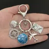 Anelli chiave Torna Torna Earth Tornario Pendente Personalità Regalo Ring Memorial Ring per amanti di viaggio Catene Drop Delivery SmTup