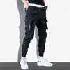 Pantaloni maschili in neri in cotone grigio cotone maschio tasca autunno jogger cuffia per cuffie per le versanti casuali 2023 abbigliamento hip hop