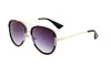 Designer solglasögon för kvinnor och män modemodell special UV 400 skyddsbrev stor ben dubbel strålram utomhus varumärken design legering diamant solglasögon 0062