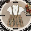 kids Tracksuits fashion summer suits girls dress sets Size 100-150 CM 2pcs Short sleeved polo shirt shirt and suspender skirt Free shipping April11
