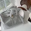 ダッフルバッグデザイナーシルバーエンボストーリング荷物のための革張りクラシック女性クロスボディトートショルダーバッグメンズレディースハンドバッグ