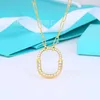 Designer Nuova collana con blocco di blocco Tiffays di zecca con placcatura in oro 18K e diamanti in una catena versatile personalizzata di rame personalizzato in rame con logo