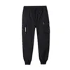 Pantaloni maschili in neri in cotone grigio cotone maschio tasca autunno jogger cuffia per cuffie per le versanti casuali 2023 abbigliamento hip hop